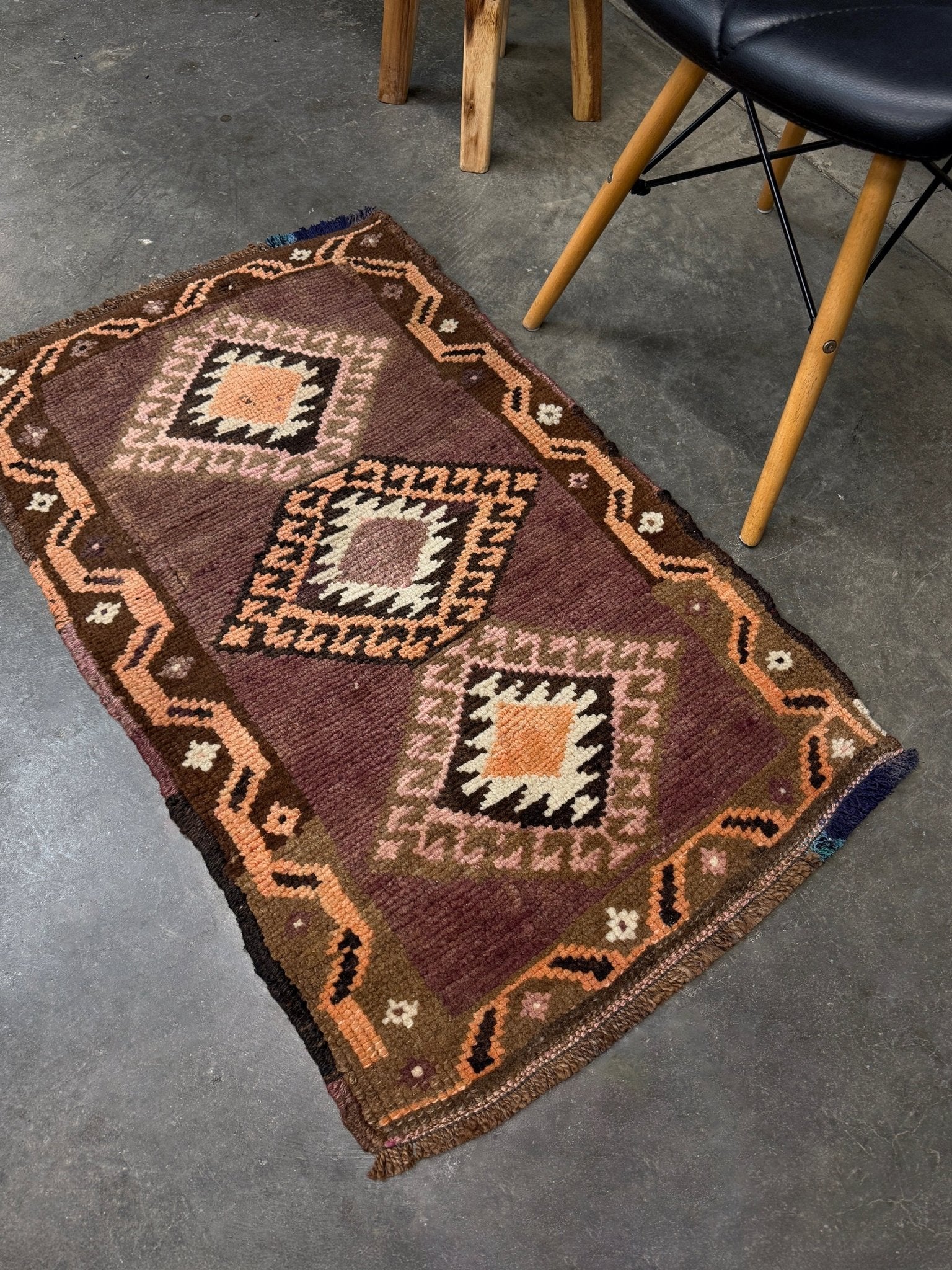 Earthy mauve and brown vintage Turkish mini rug with stacked diamond medallions in peach and ivory, handmade Anatolian Yastik rug 2x3, perfect for entryway or bedside accent, kitchen.