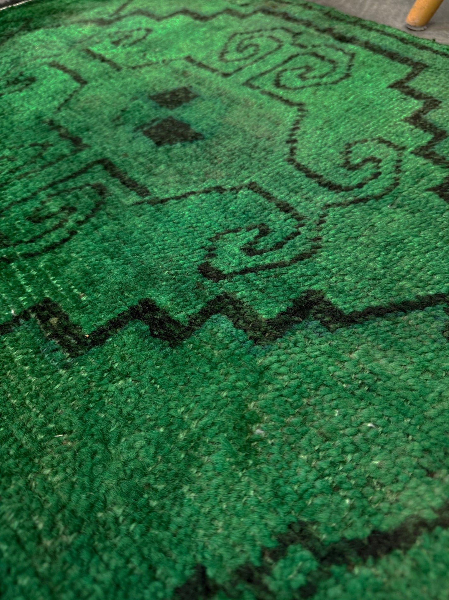 Vintage Turkish Yastik rug in emerald, forest, and moss green with espresso-black tribal outlines. Hand-knotted wool, 20x43 inches. One-of-a-kind rug from Indigo Rugs, the best rug shop in the San Francisco Bay Area (Burlingame, CA). Free shipping included.