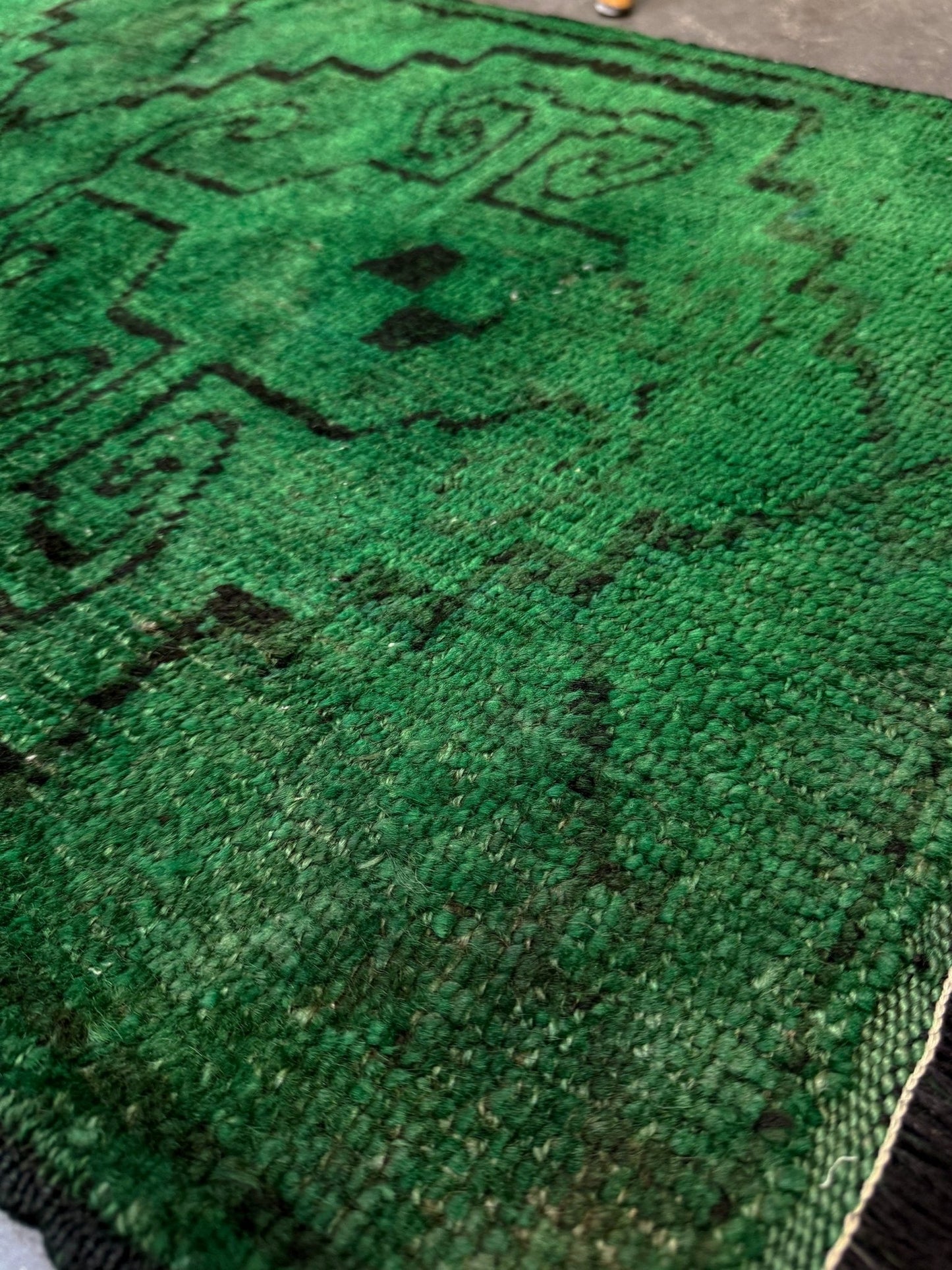 Vintage Turkish Yastik rug in emerald, forest, and moss green with espresso-black tribal outlines. Hand-knotted wool, 20x43 inches. One-of-a-kind rug from Indigo Rugs, the best rug shop in the San Francisco Bay Area (Burlingame, CA). Free shipping included.