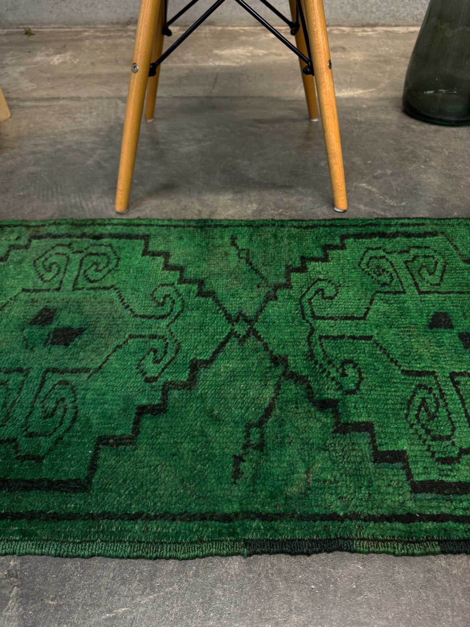 Vintage Turkish Yastik rug in emerald, forest, and moss green with espresso-black tribal outlines. Hand-knotted wool, 20x43 inches. One-of-a-kind rug from Indigo Rugs, the best rug shop in the San Francisco Bay Area (Burlingame, CA). Free shipping included.