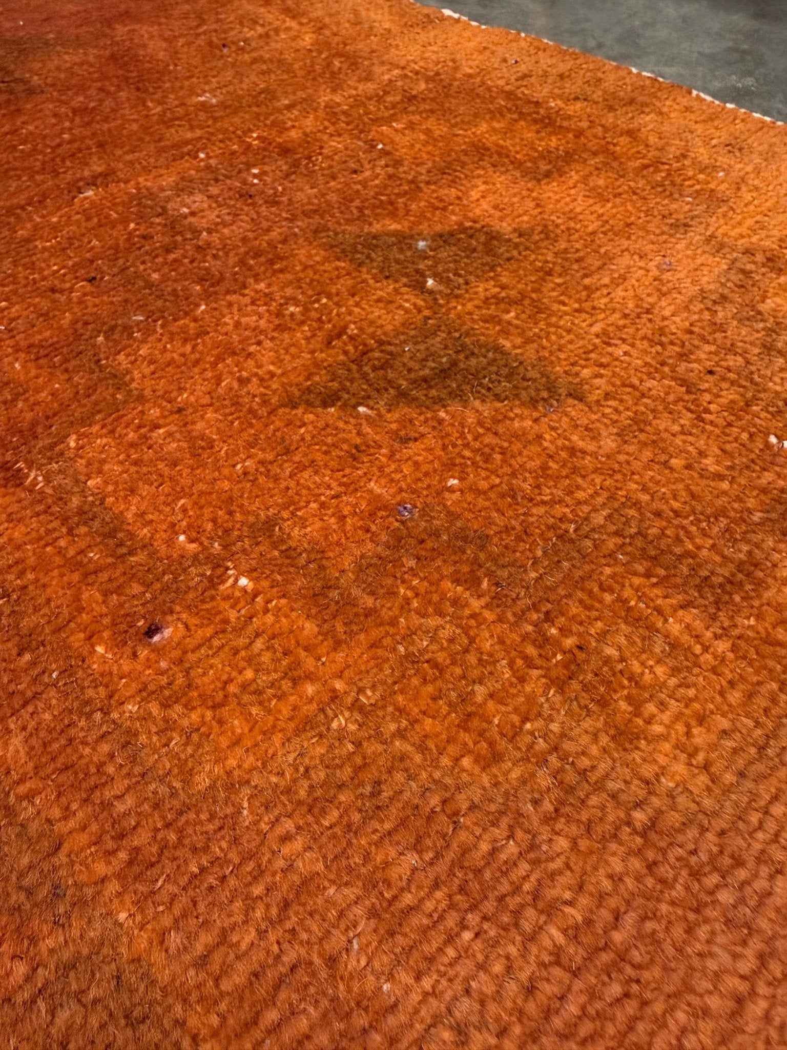 Vintage terracotta orange  abstract transitional Turkish mini rug 21x39 with subtle tonal variations and minimalist design, handmade wool rug from Indigo Rugs in Burlingame, San Francisco Bay Area. Doormat bathmat perfect foe entry doorway kitchen. Free shipping.