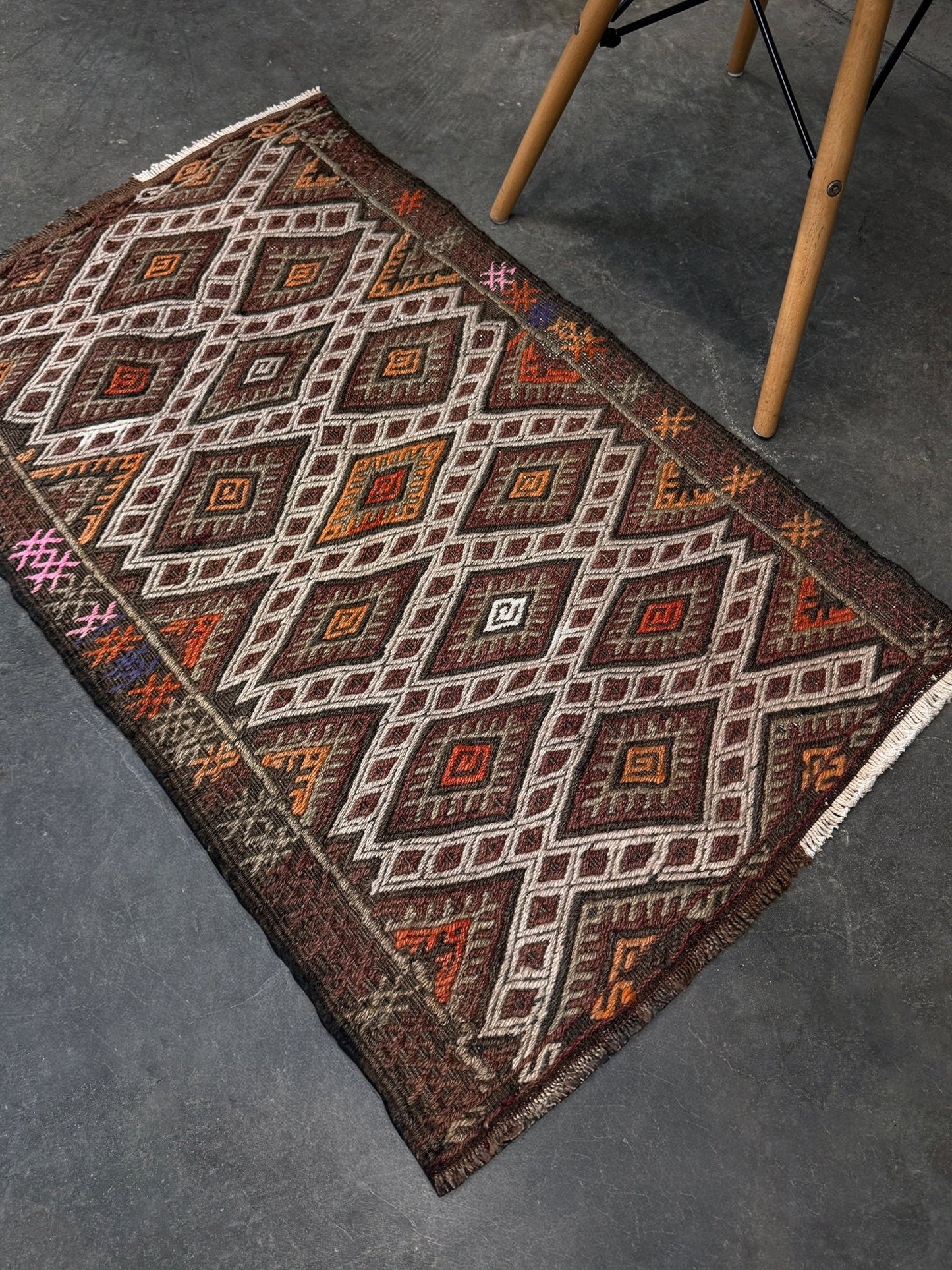 Vintage Turkish cicim embroidered mini kilim rug in earth brown with geometric diamond lattice motifs, tribal handmade flatweave wool accent rug 23x38 from Indigo Rugs Burlingame Bay Area.