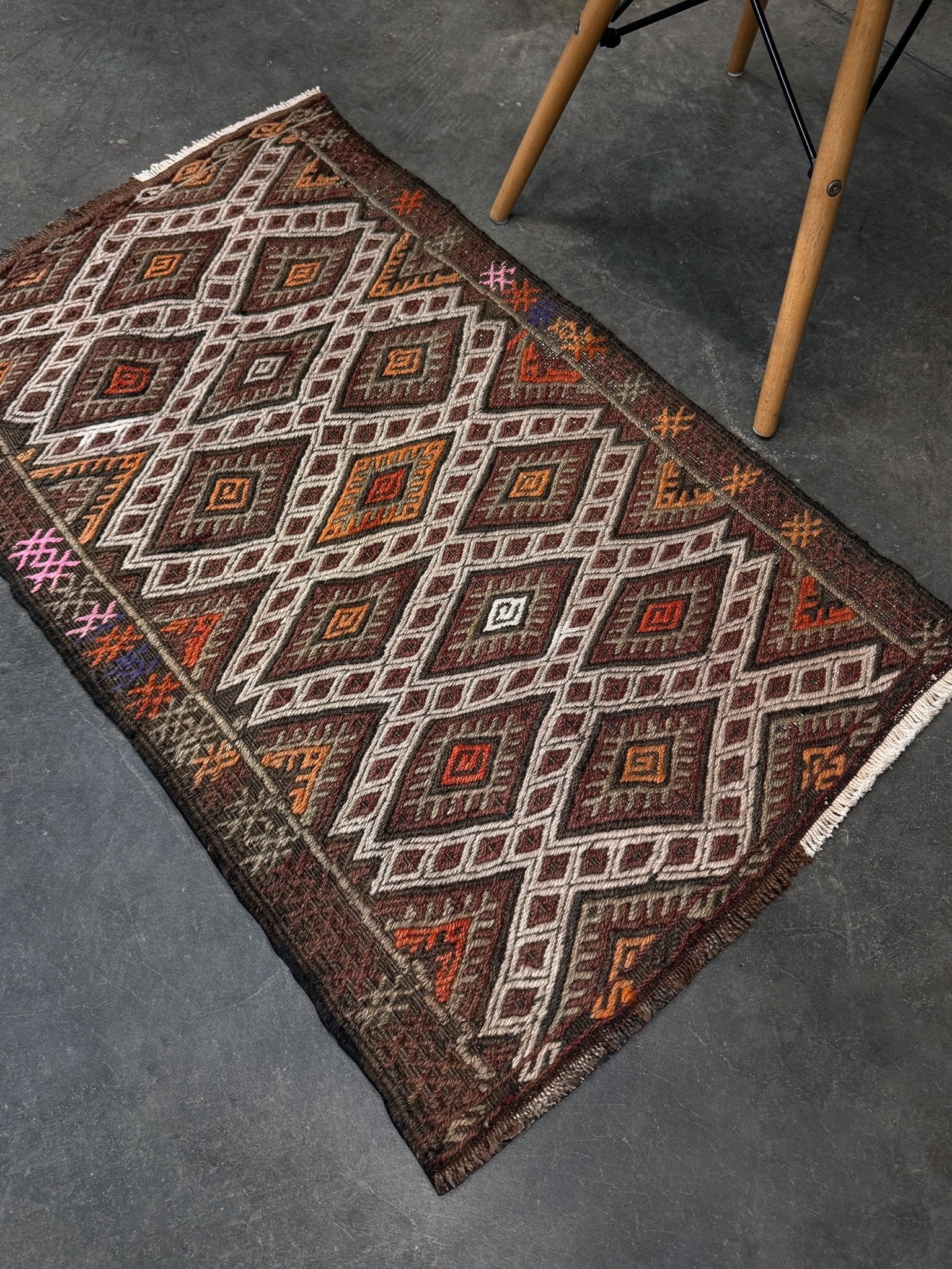 Vintage Turkish cicim embroidered mini kilim rug in earth brown with geometric diamond lattice motifs, tribal handmade flatweave wool accent rug 23x38 from Indigo Rugs Burlingame Bay Area.