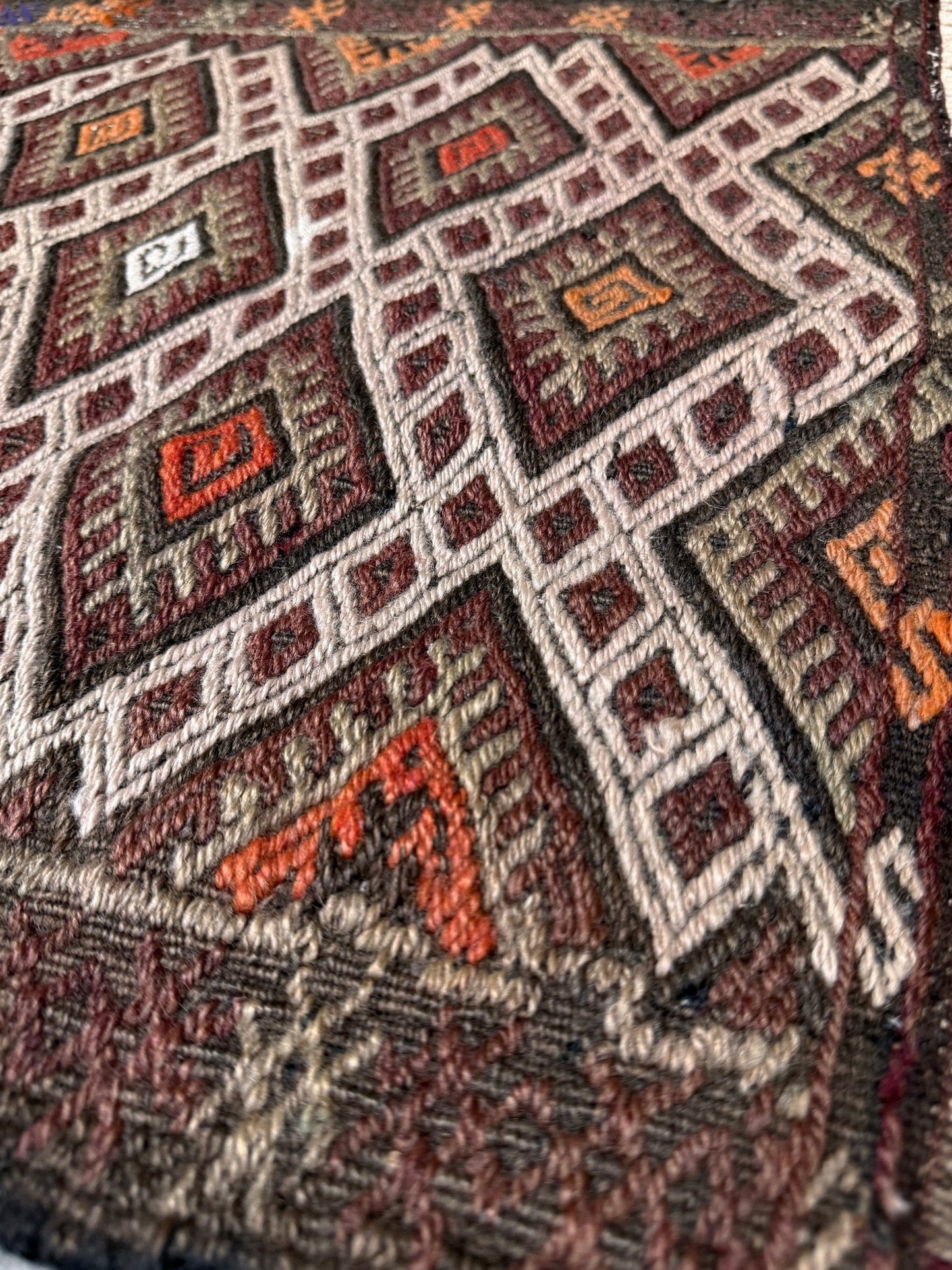 Vintage Turkish cicim embroidered mini kilim rug in earth brown with geometric diamond lattice motifs, tribal handmade flatweave wool accent rug 23x38 from Indigo Rugs Burlingame Bay Area.