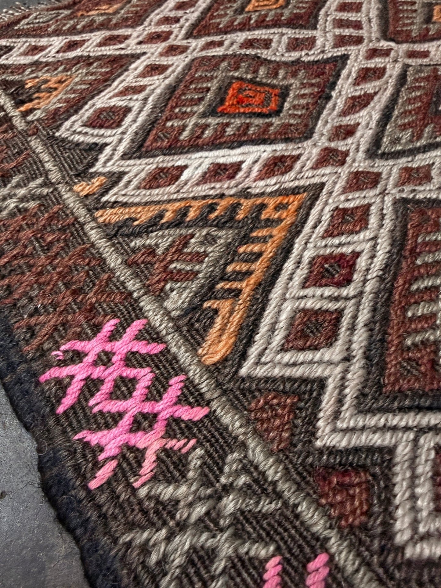Vintage Turkish cicim embroidered mini kilim rug in earth brown with geometric diamond lattice motifs, tribal handmade flatweave wool accent rug 23x38 from Indigo Rugs Burlingame Bay Area.