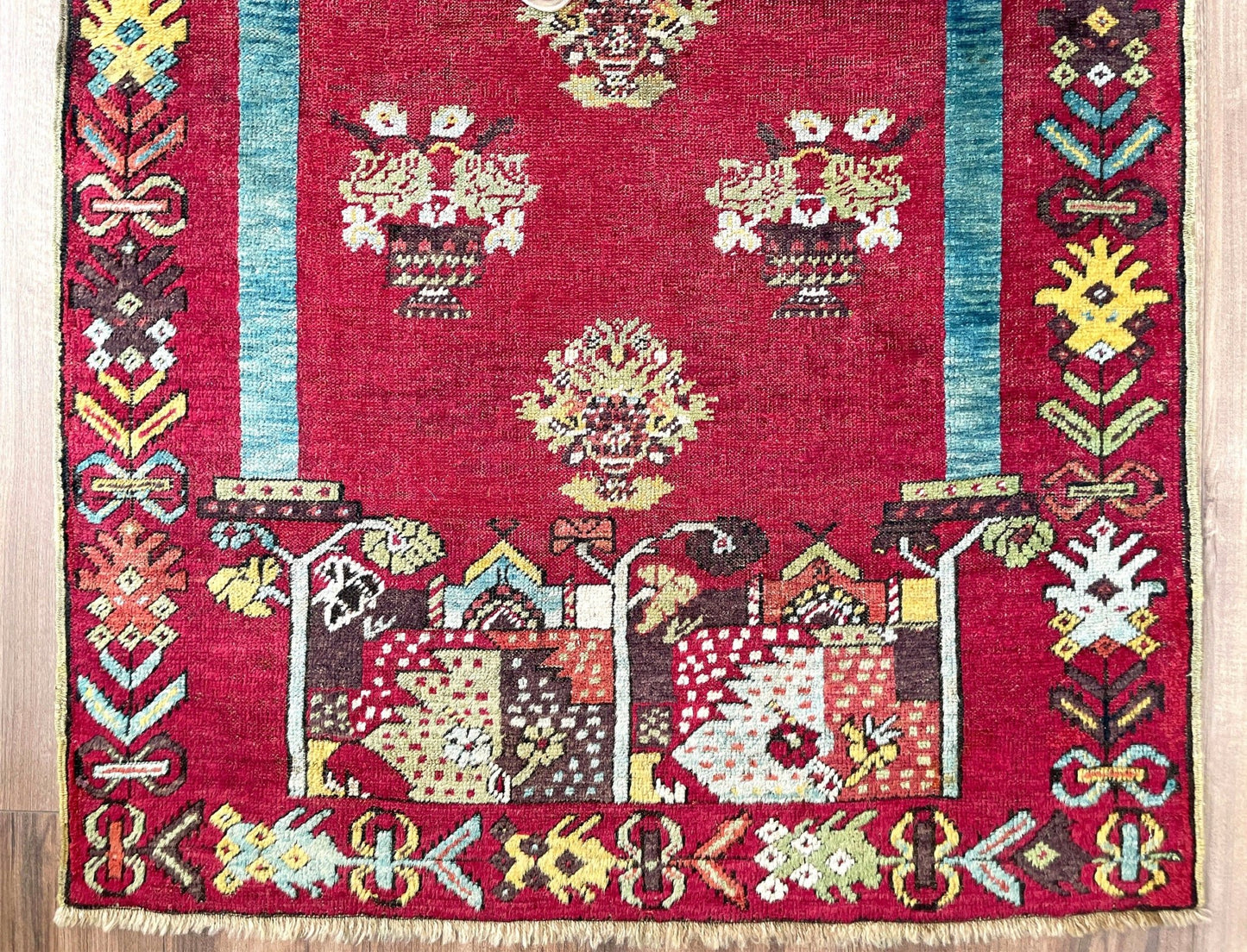 mucur Vintage Turkish rug shop san francisco bay area. antique prayer soft red rug, bold color store, local rug shop