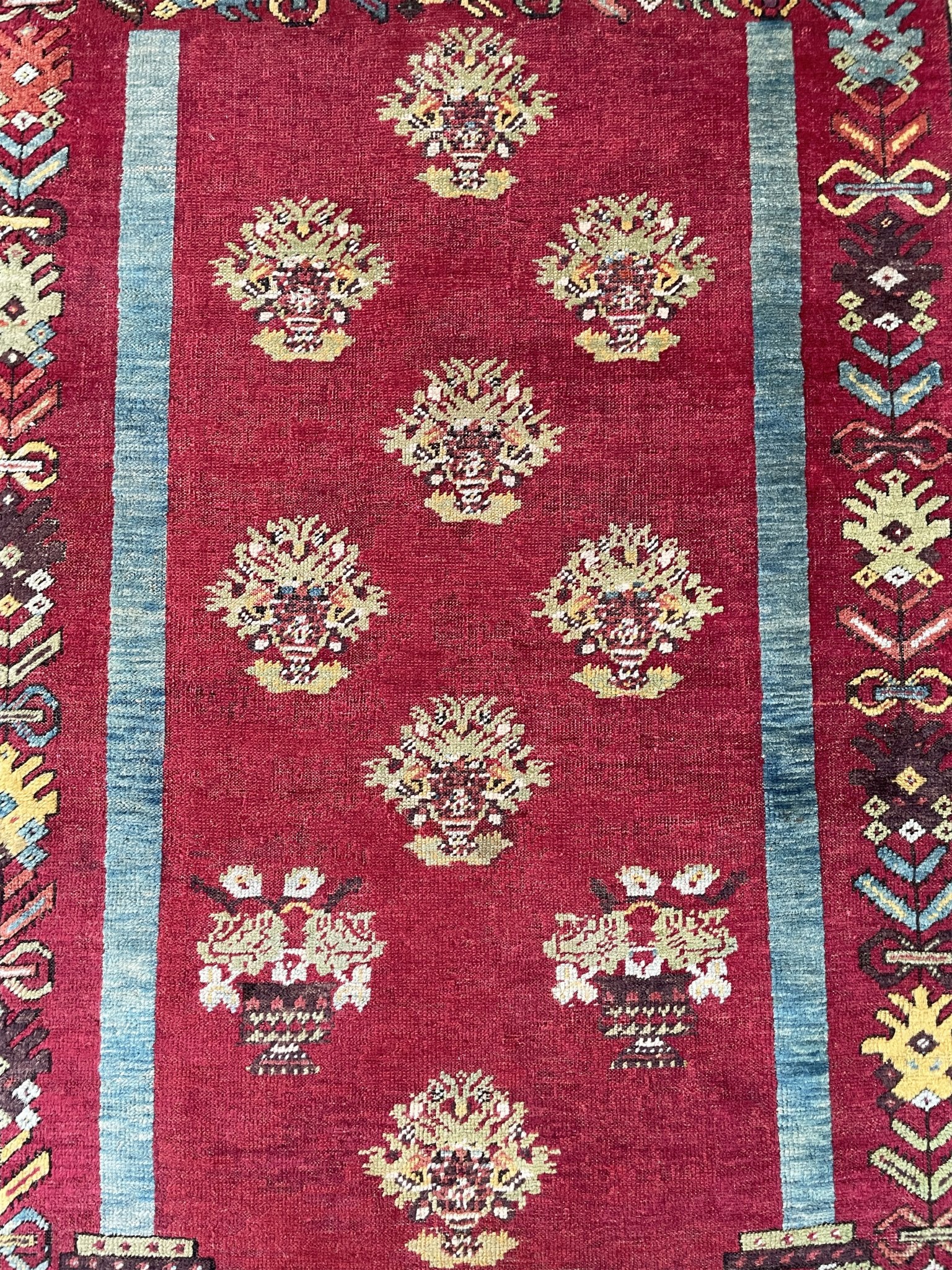 mucur Vintage Turkish rug shop san francisco bay area. antique prayer soft red rug, bold color store, local rug shop