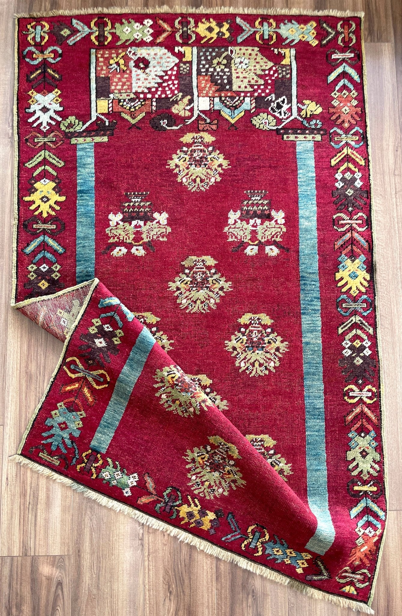 mucur Vintage Turkish rug shop san francisco bay area. antique prayer soft red rug, bold color store, local rug shop