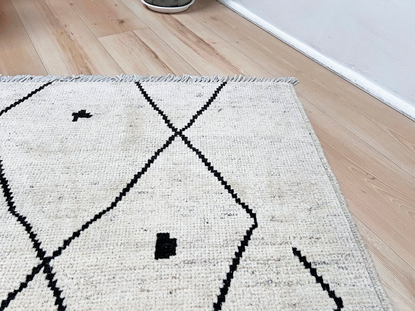 Minimalist Moroccan wool rug. White handmade rug shop san francisco bay area. 