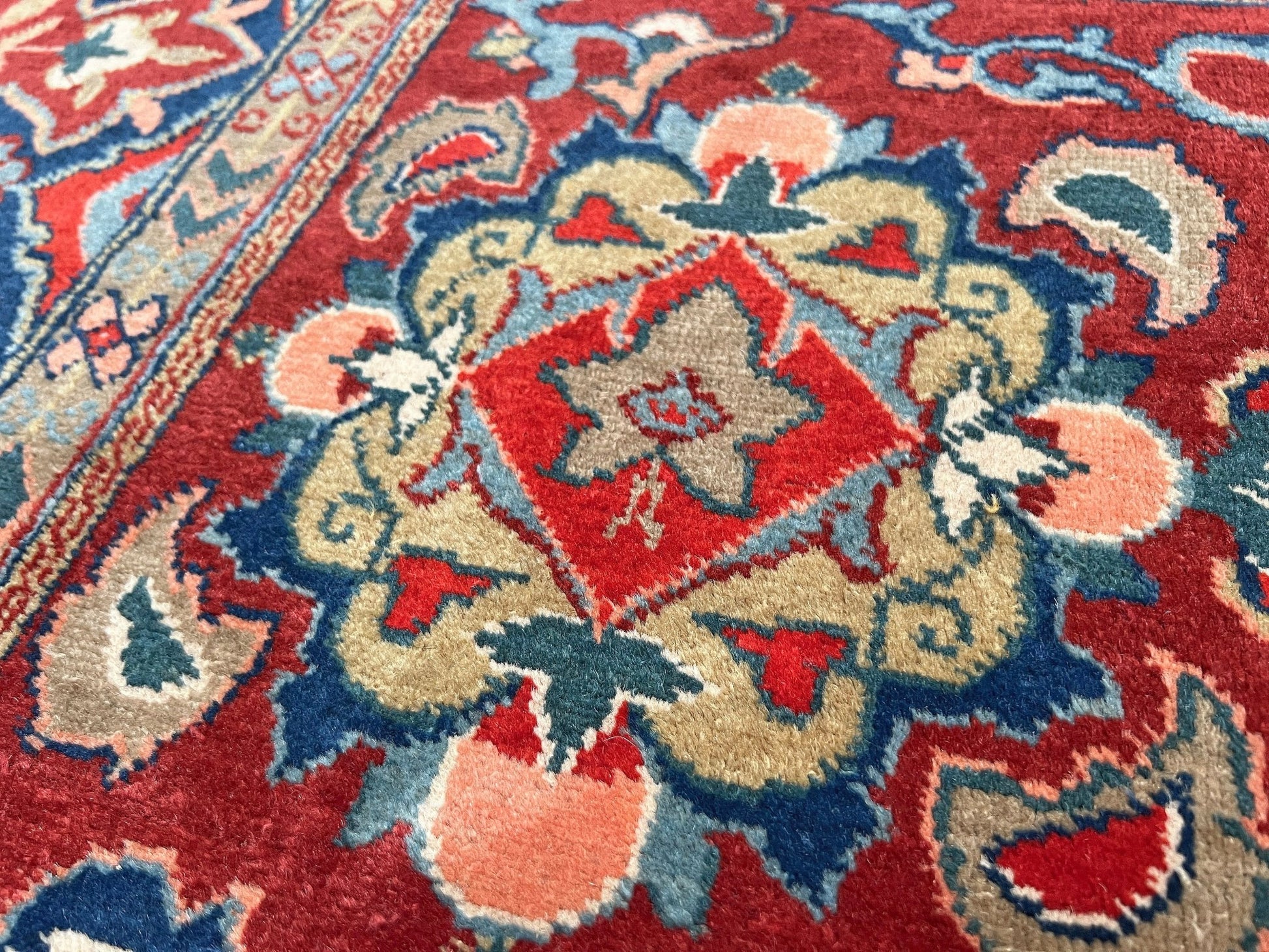 kuba handmade wool caucasian vintage floral rug. Small scatter 5x7 rug. Oriental rug shop San Francisco Bay Area