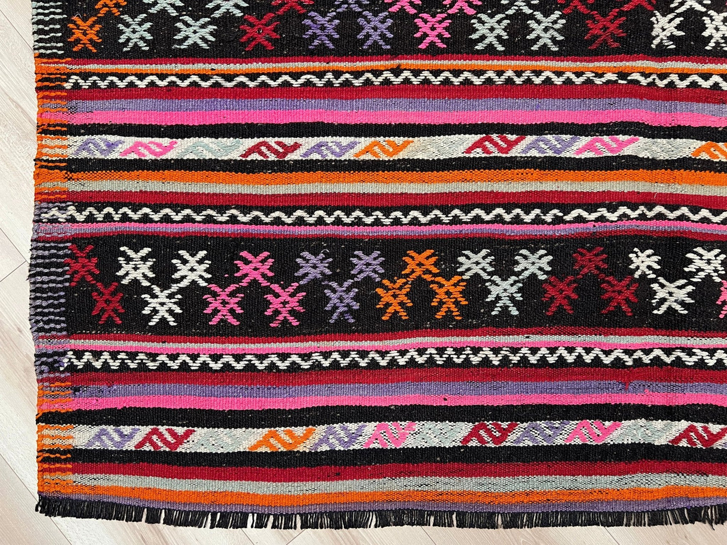 Pink striped Turkish kilim rug shop berkeley. Handmade rug San Francisco bay area. Vibrant color handmade wool rug. 