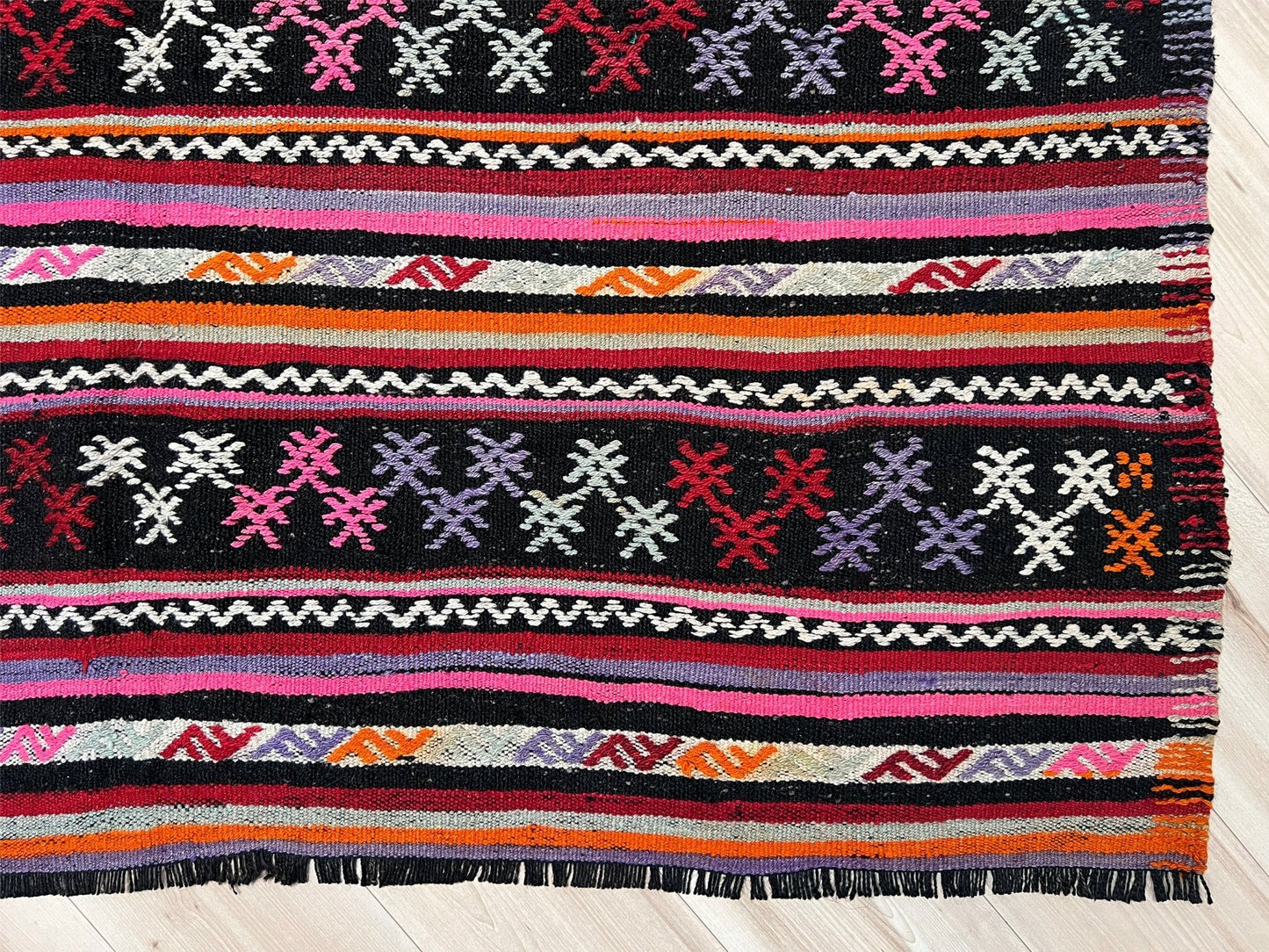 Pink striped Turkish kilim rug shop berkeley. Handmade rug San Francisco bay area. Vibrant color handmade wool rug. 