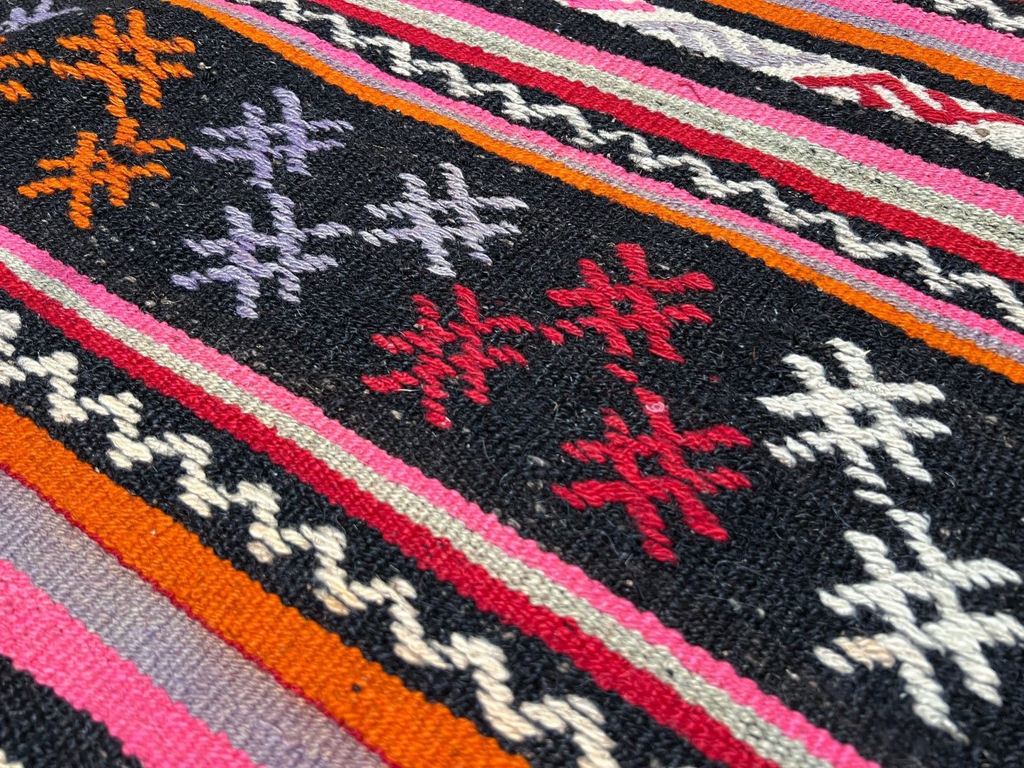 Pink striped Turkish kilim rug shop berkeley. Handmade rug San Francisco bay area. Vibrant color handmade wool rug. 