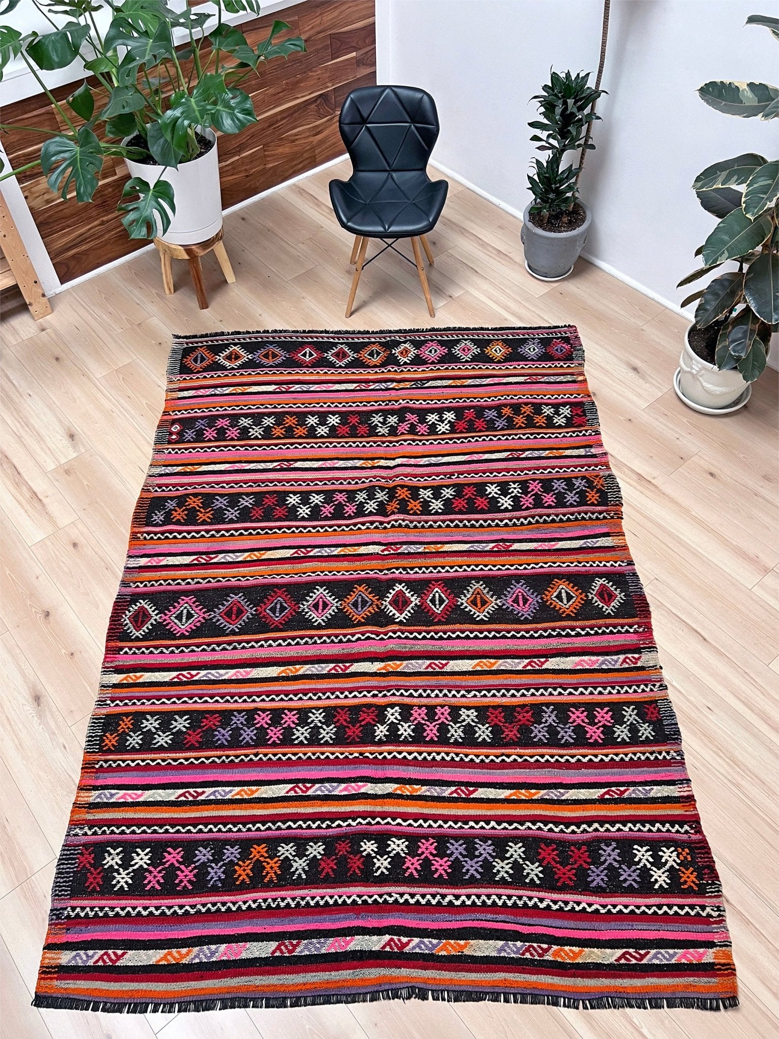 Pink striped Turkish kilim rug shop berkeley. Handmade rug San Francisco bay area. Vibrant color handmade wool rug. 