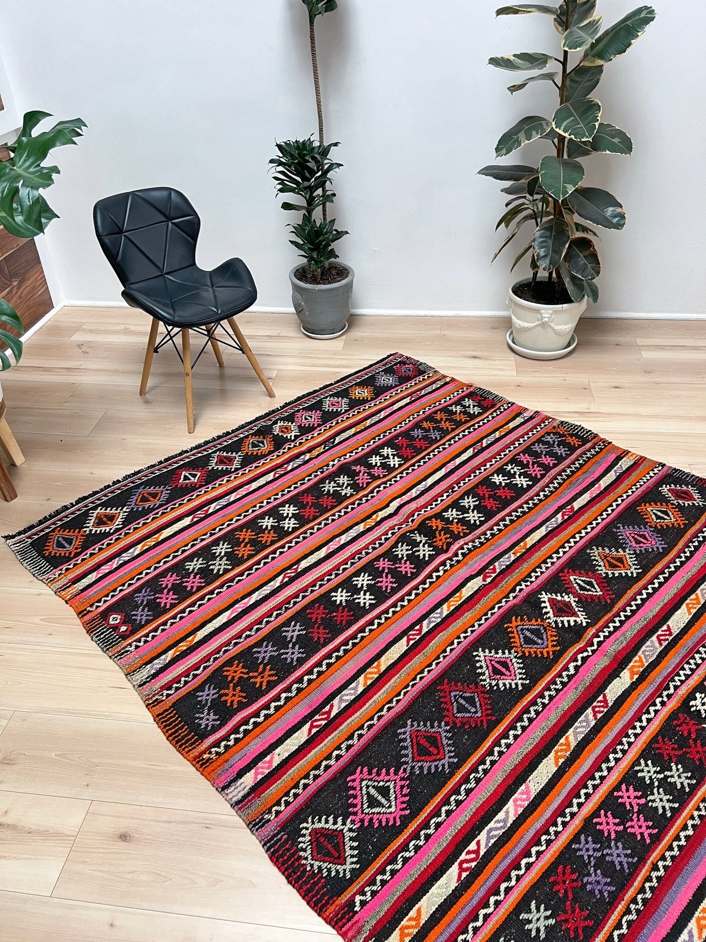 Pink striped Turkish kilim rug shop berkeley. Handmade rug San Francisco bay area. Vibrant color handmade wool rug. 