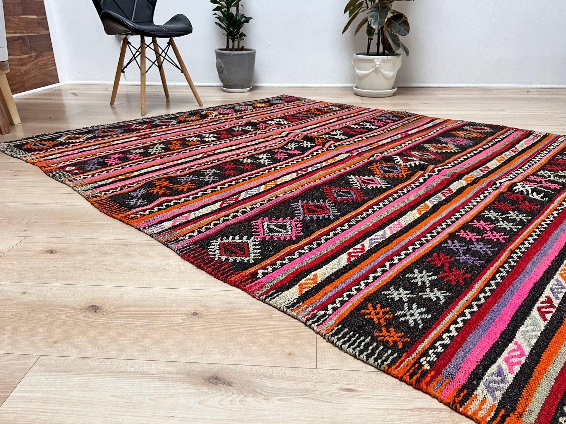 Pink striped Turkish kilim rug shop berkeley. Handmade rug San Francisco bay area. Vibrant color handmade wool rug. 