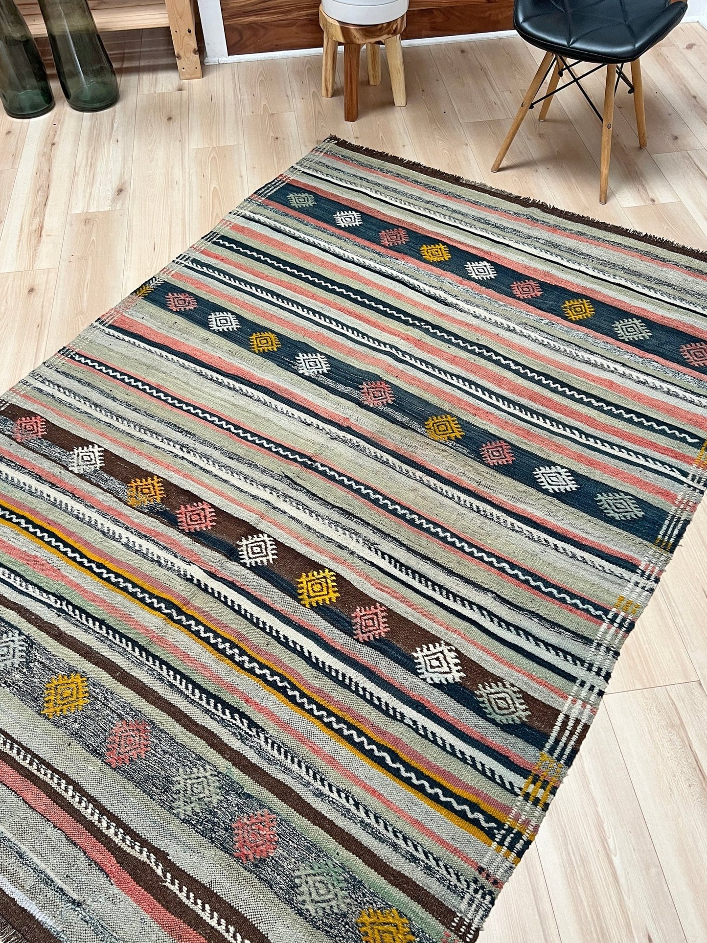 vintage turkish kilim rug in living room setting, bright colors, indigo rugs, soft rug, bold color, San Francisco Bay Area, California, rug store, rug shop, local shop, vintage rug, modern kilim, warm colors, antique rug, antique kilim.