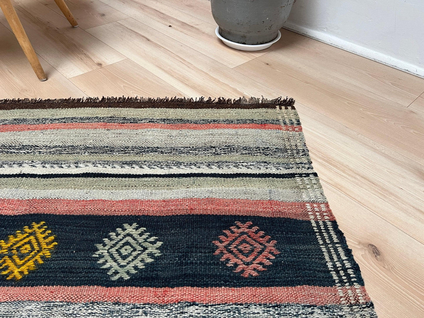 vintage turkish kilim rug in living room setting, bright colors, indigo rugs, soft rug, bold color, San Francisco Bay Area, California, rug store, rug shop, local shop, vintage rug, modern kilim, warm colors, antique rug, antique kilim.