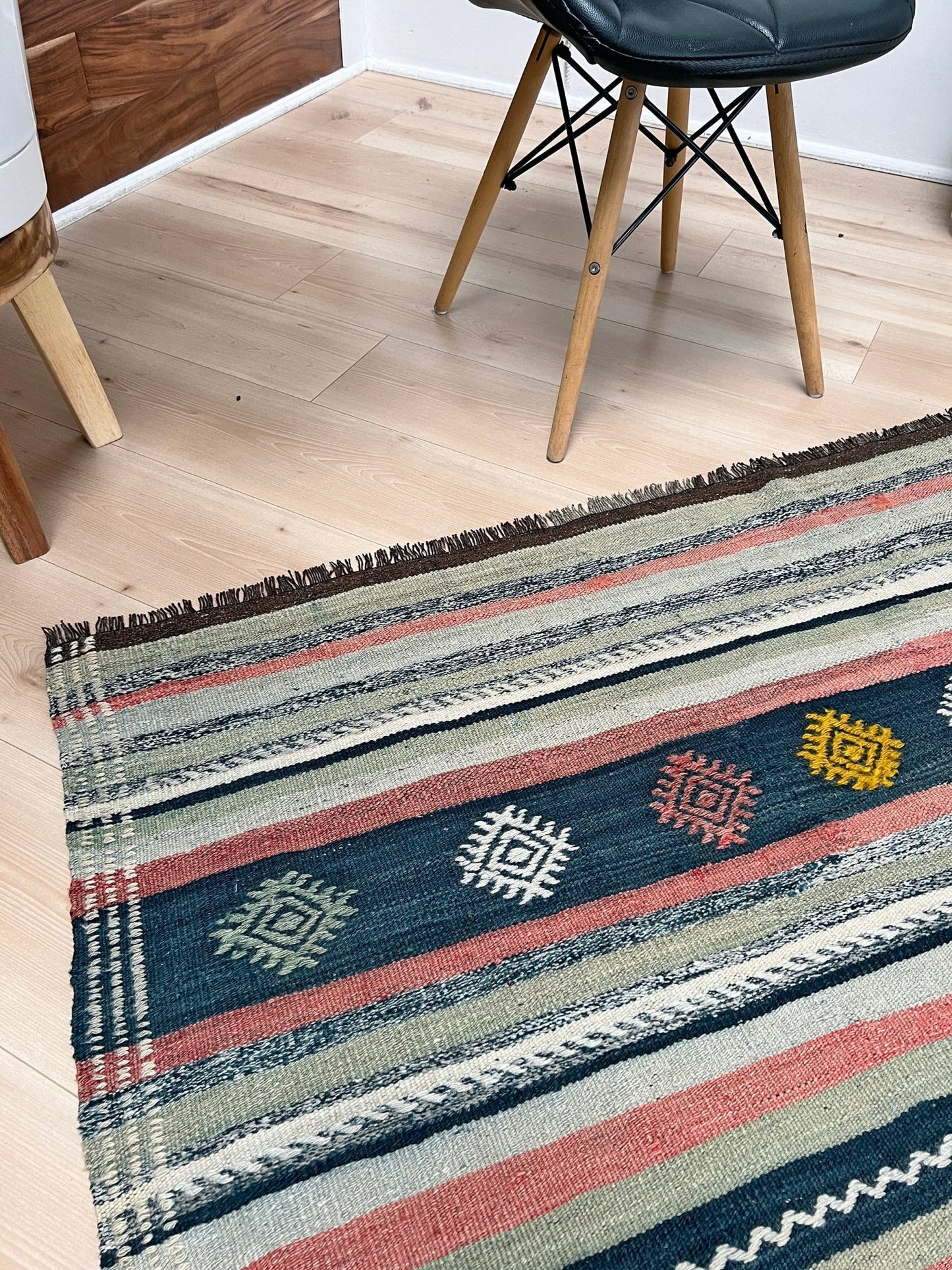 vintage turkish kilim rug in living room setting, bright colors, indigo rugs, soft rug, bold color, San Francisco Bay Area, California, rug store, rug shop, local shop, vintage rug, modern kilim, warm colors, antique rug, antique kilim.