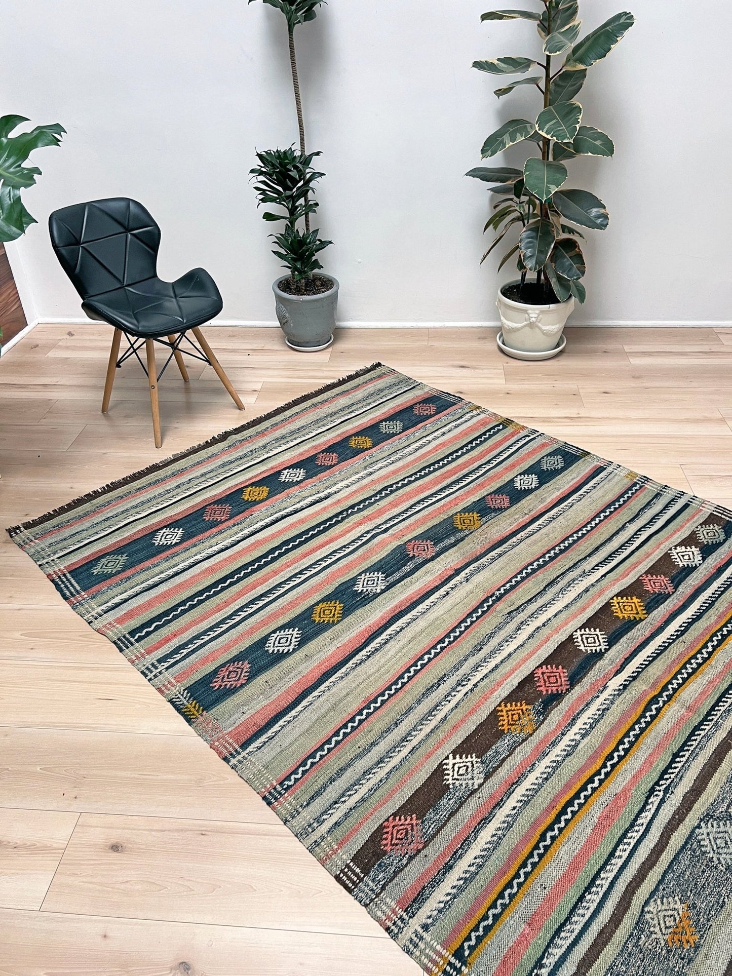 vintage turkish kilim rug in living room setting, bright colors, indigo rugs, soft rug, bold color, San Francisco Bay Area, California, rug store, rug shop, local shop, vintage rug, modern kilim, warm colors, antique rug, antique kilim.