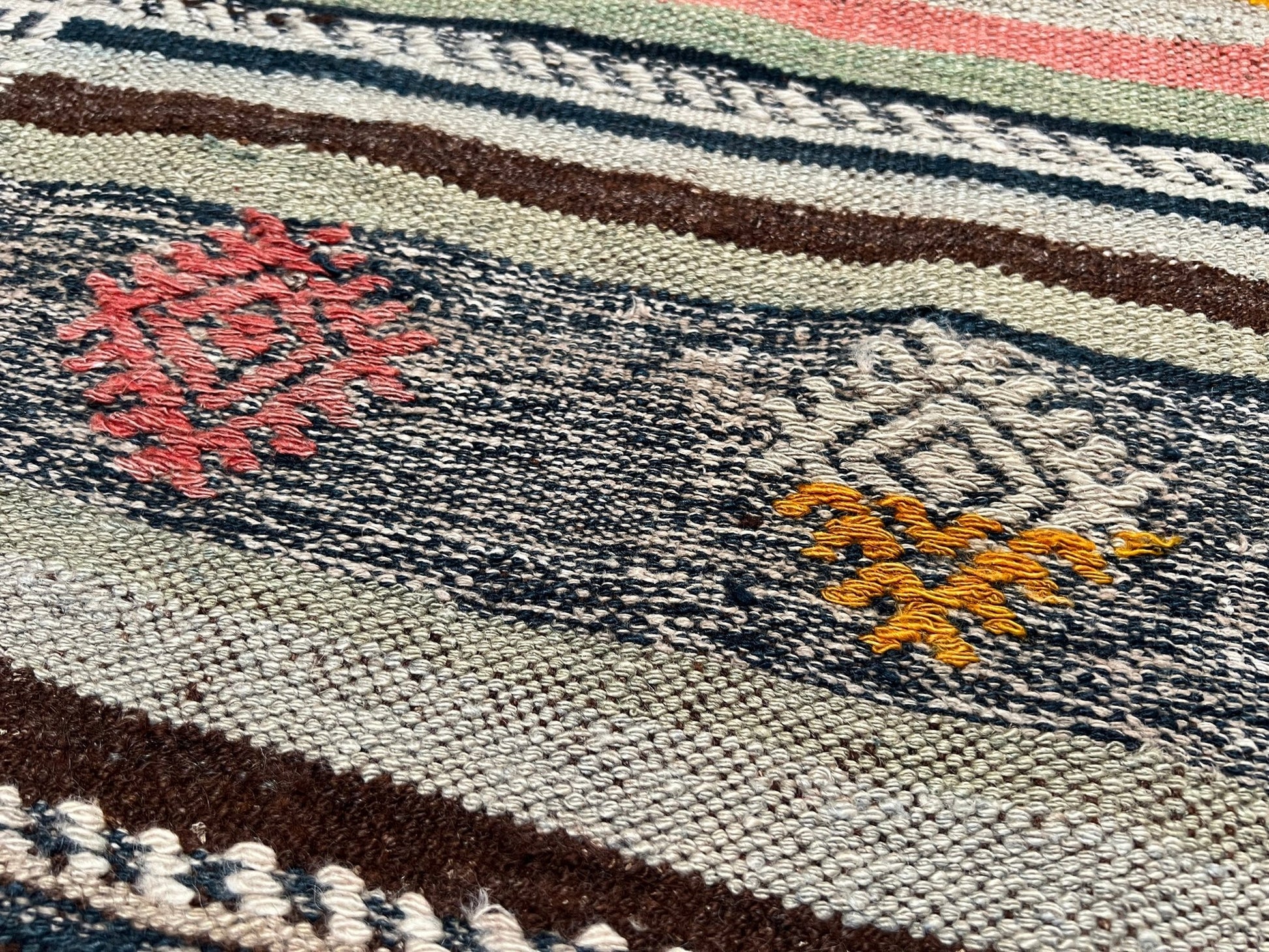 vintage turkish kilim rug in living room setting, bright colors, indigo rugs, soft rug, bold color, San Francisco Bay Area, California, rug store, rug shop, local shop, vintage rug, modern kilim, warm colors, antique rug, antique kilim.