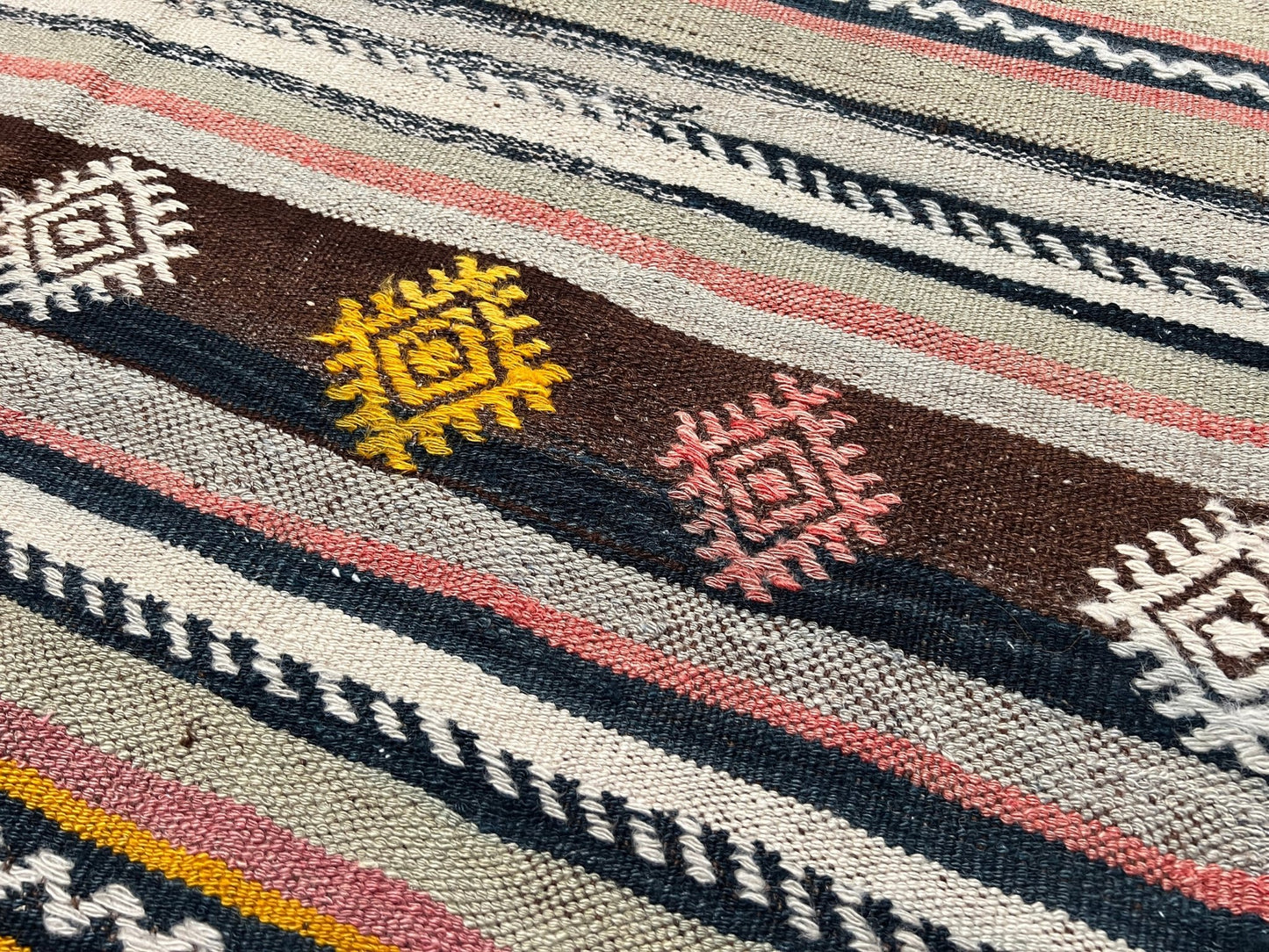 vintage turkish kilim rug in living room setting, bright colors, indigo rugs, soft rug, bold color, San Francisco Bay Area, California, rug store, rug shop, local shop, vintage rug, modern kilim, warm colors, antique rug, antique kilim.