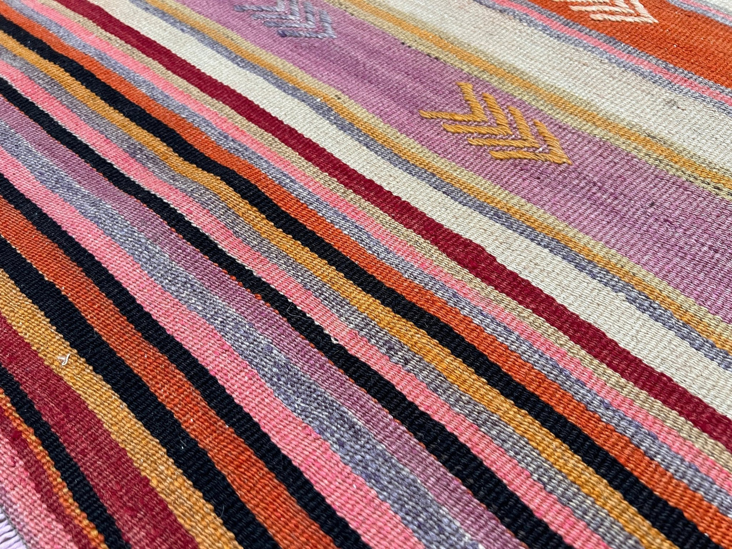 Vintage turkish kilim rug shop bay area. Handmade vibrant rug in living room setting. 6x8 handmade wool rug.  Kilim shop san francisco bay area berkeley california.