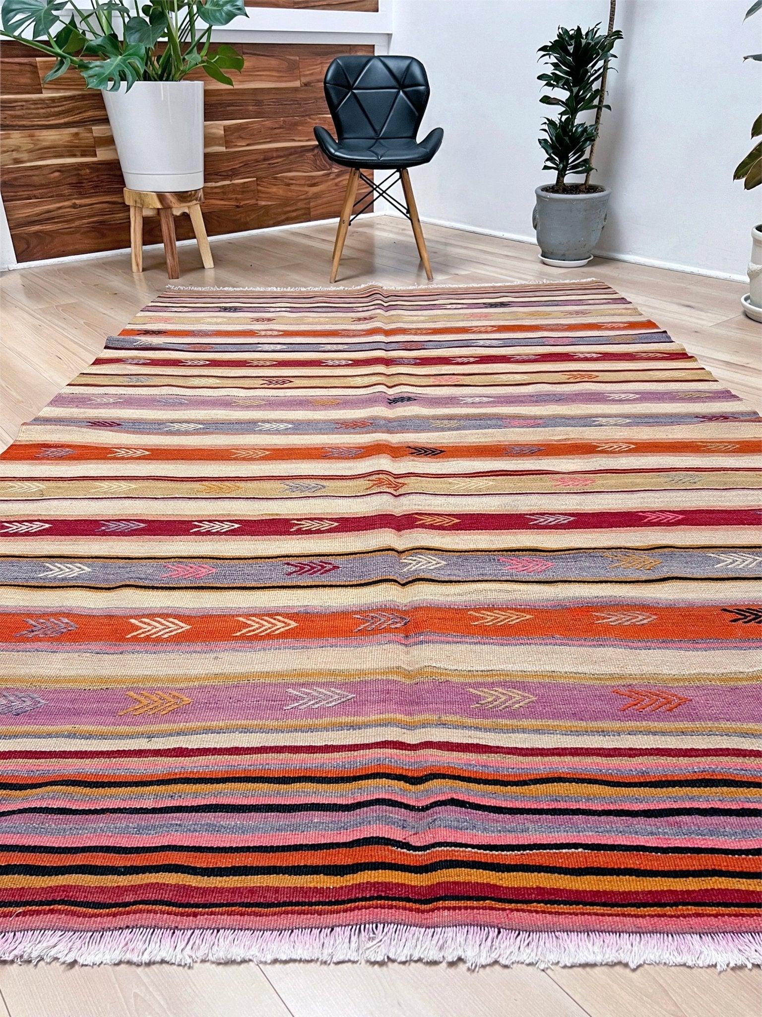 Vintage turkish kilim rug shop bay area. Handmade vibrant rug in living room setting. 6x8 handmade wool rug.  Kilim shop san francisco bay area berkeley california.