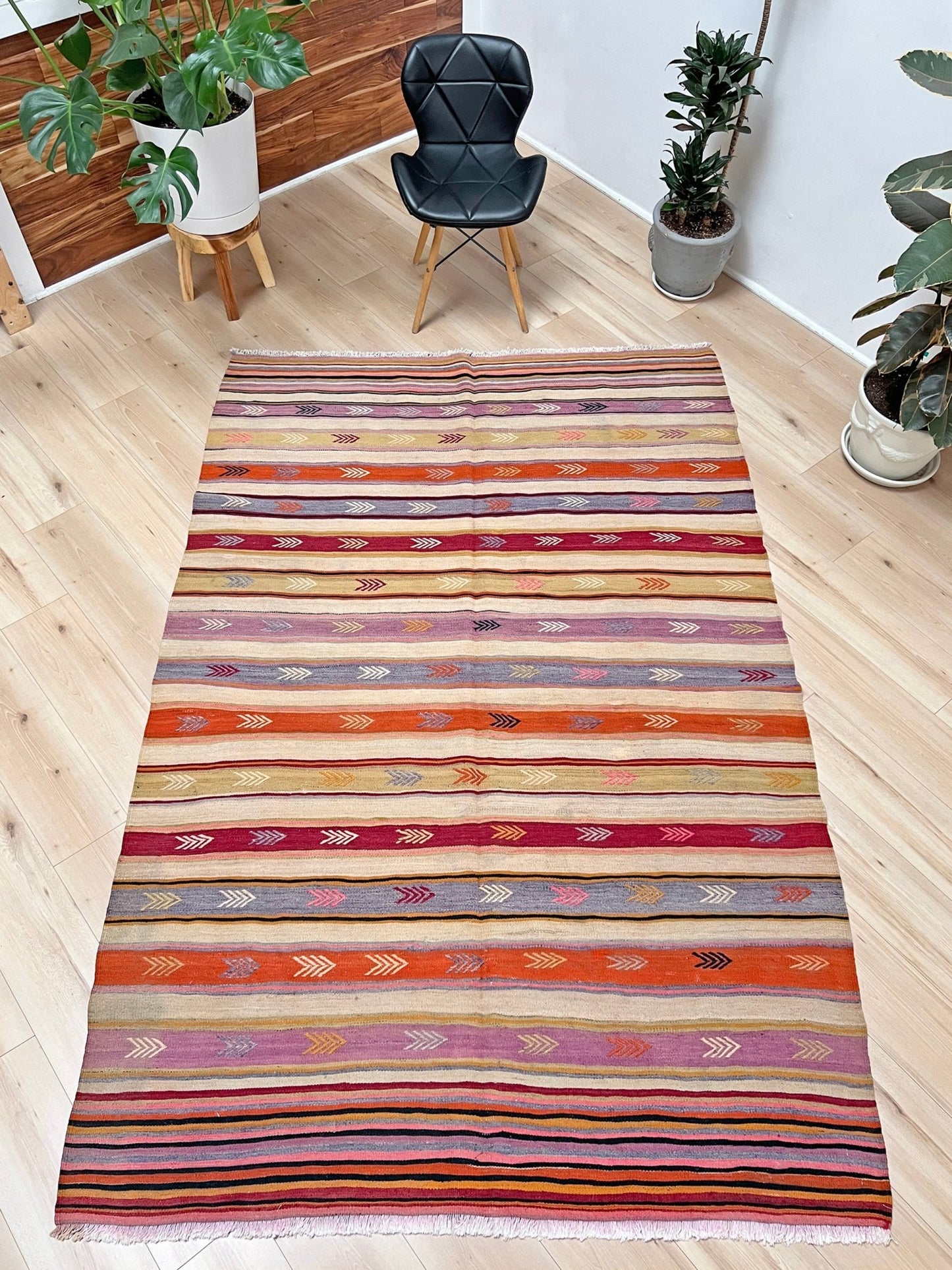 Vintage turkish kilim rug shop bay area. Handmade vibrant rug in living room setting. 6x8 handmade wool rug.  Kilim shop san francisco bay area berkeley california.