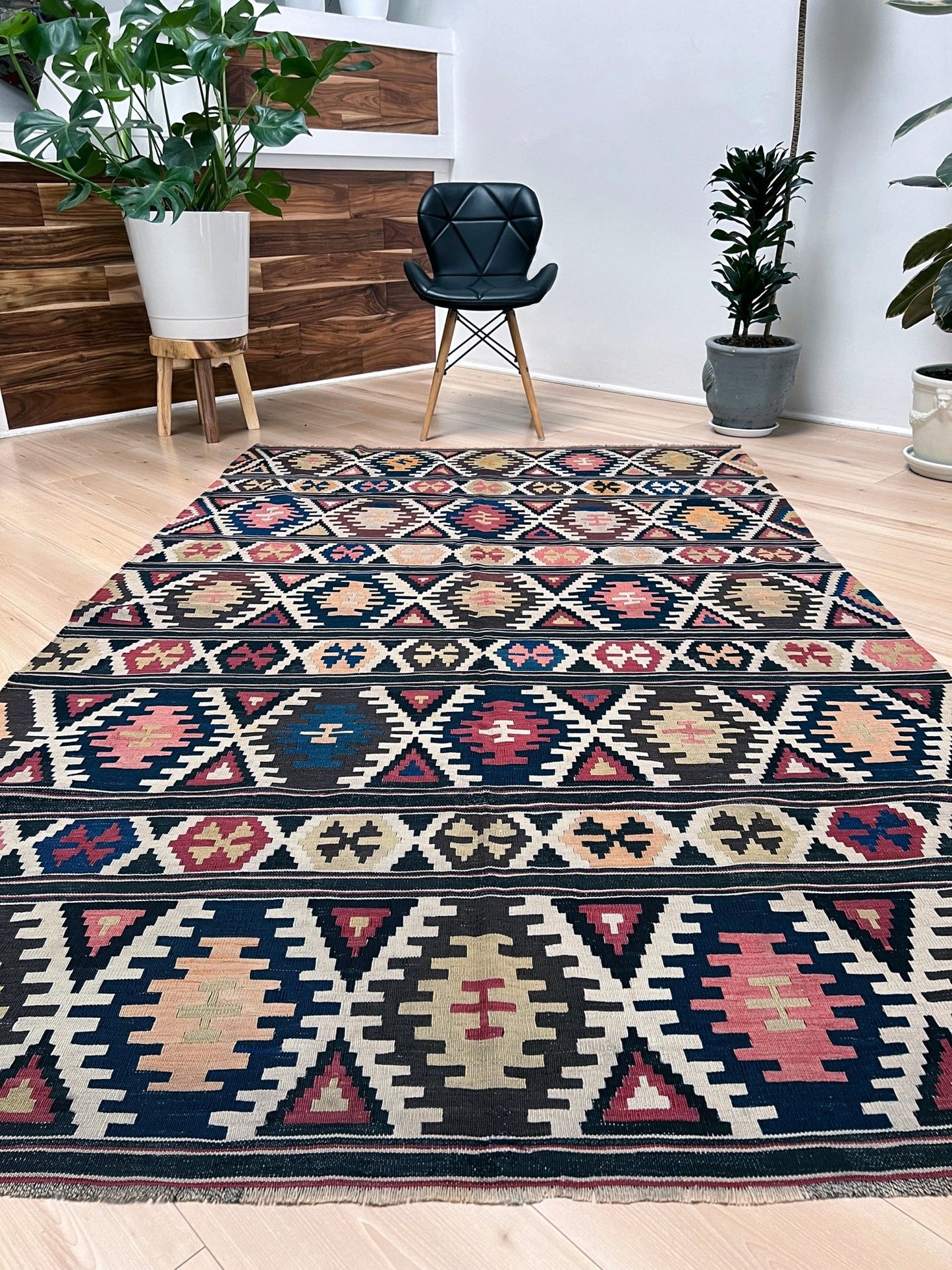 Kazak caucasian tribal kilim rug with vibrant rug. Handmade in living room setting. Flatweave rug shop Bay Area SF, California.  Wool rug for nursery Bright colors, bold color, rug store, rug shop  Palo Alto, berkeley, vintage rug, modern kilim, warm colors, antique rug.