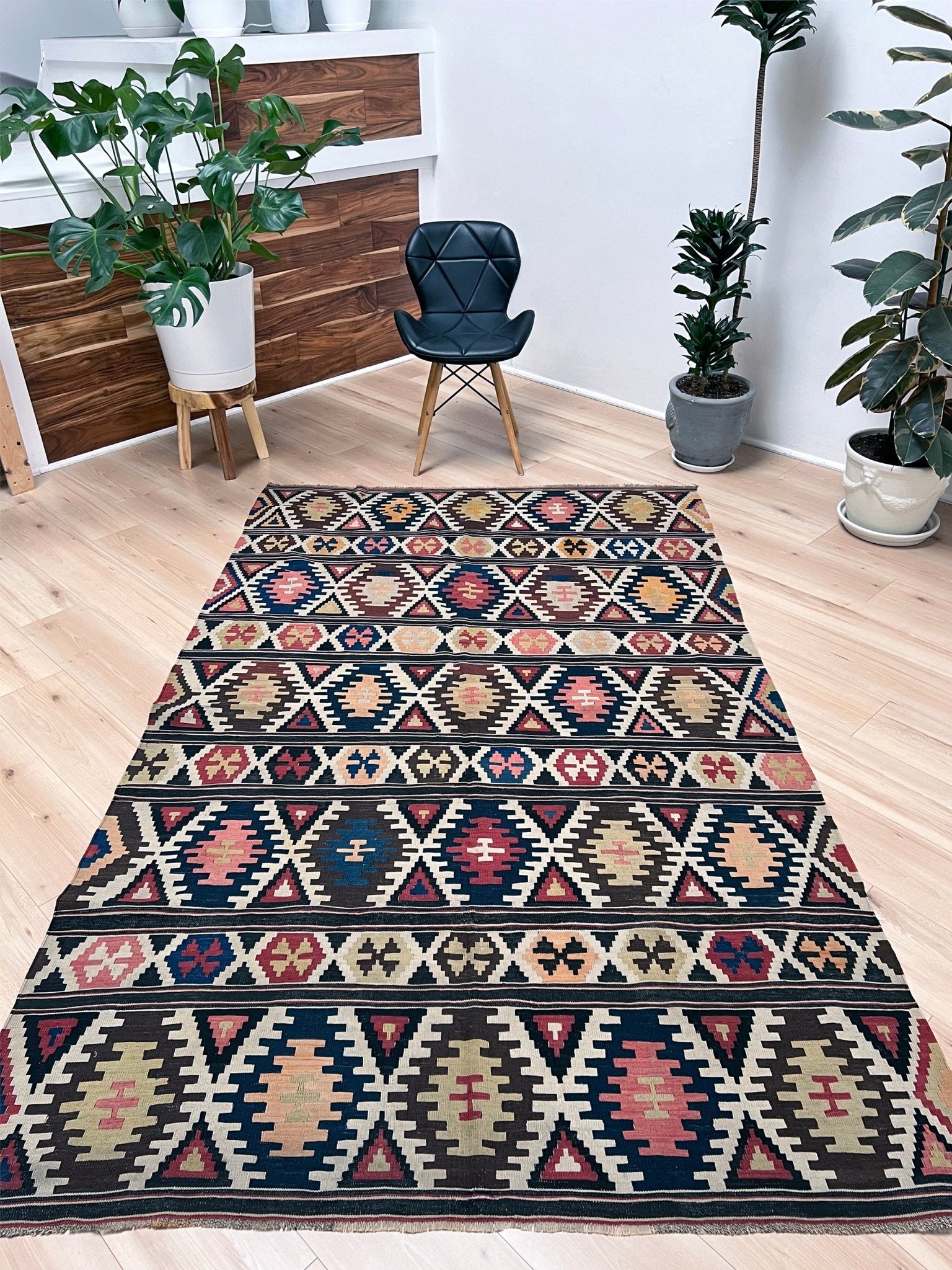 Kazak caucasian tribal kilim rug with vibrant rug. Handmade in living room setting. Flatweave rug shop Bay Area SF, California.  Wool rug for nursery Bright colors, bold color, rug store, rug shop  Palo Alto, berkeley, vintage rug, modern kilim, warm colors, antique rug.