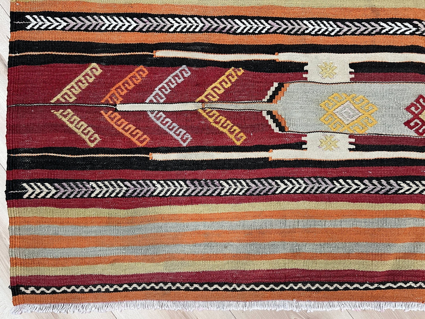 Sivas lambali turkish kilim rug shop San francisco bay area. Handmade vintage wool flatweave rug. Vibrant turkish striped rug.